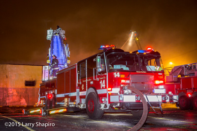 Chicago firefighters battle a commercial building fire at 5130 W Fulerton Ave 4-4-16 Larry Shapiro photographer shapirophotography.net E-ONE HP100 tower ladder
